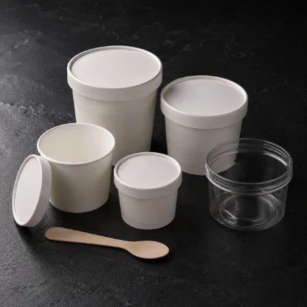 Gelato tubs, pans and lids stacked for printing
